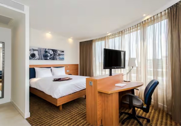 Queen Corner Room with Sofa Bed