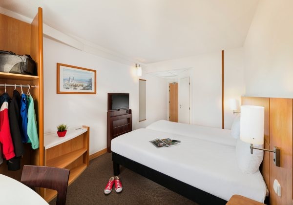 Room With 2 Single Beds Equipped With Th